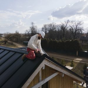 full-shot-roofer-working-with-helmet