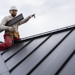 full-shot-smiley-man-working-roof